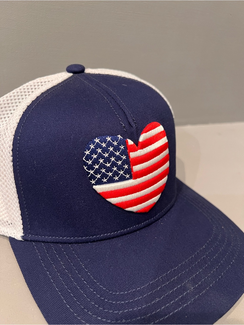 Ladies Navy and White Trucker Cap with American Flag Heart Patch
